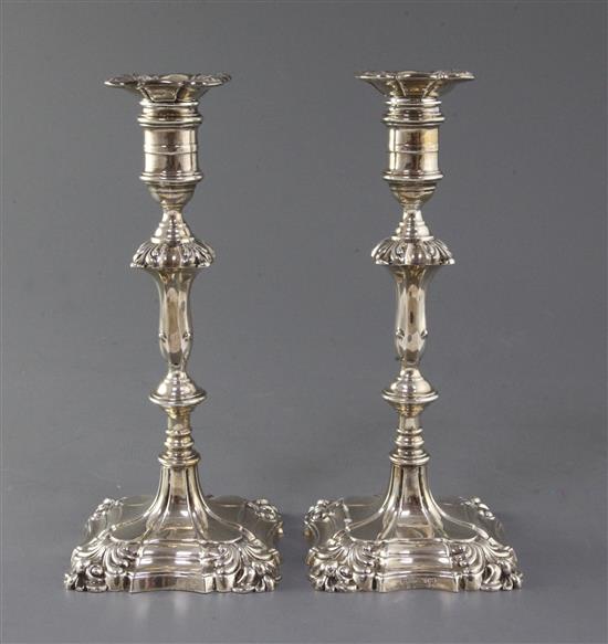 A pair of George V 18th century style candlesticks by George Edward & Sons, 30 oz.